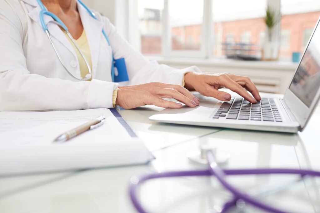 doctor evaluating protected health information for patient