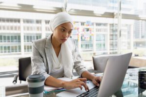 business woman utilizing managed it services for small businesses