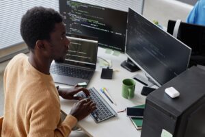 managed it service provider working on codes on computer